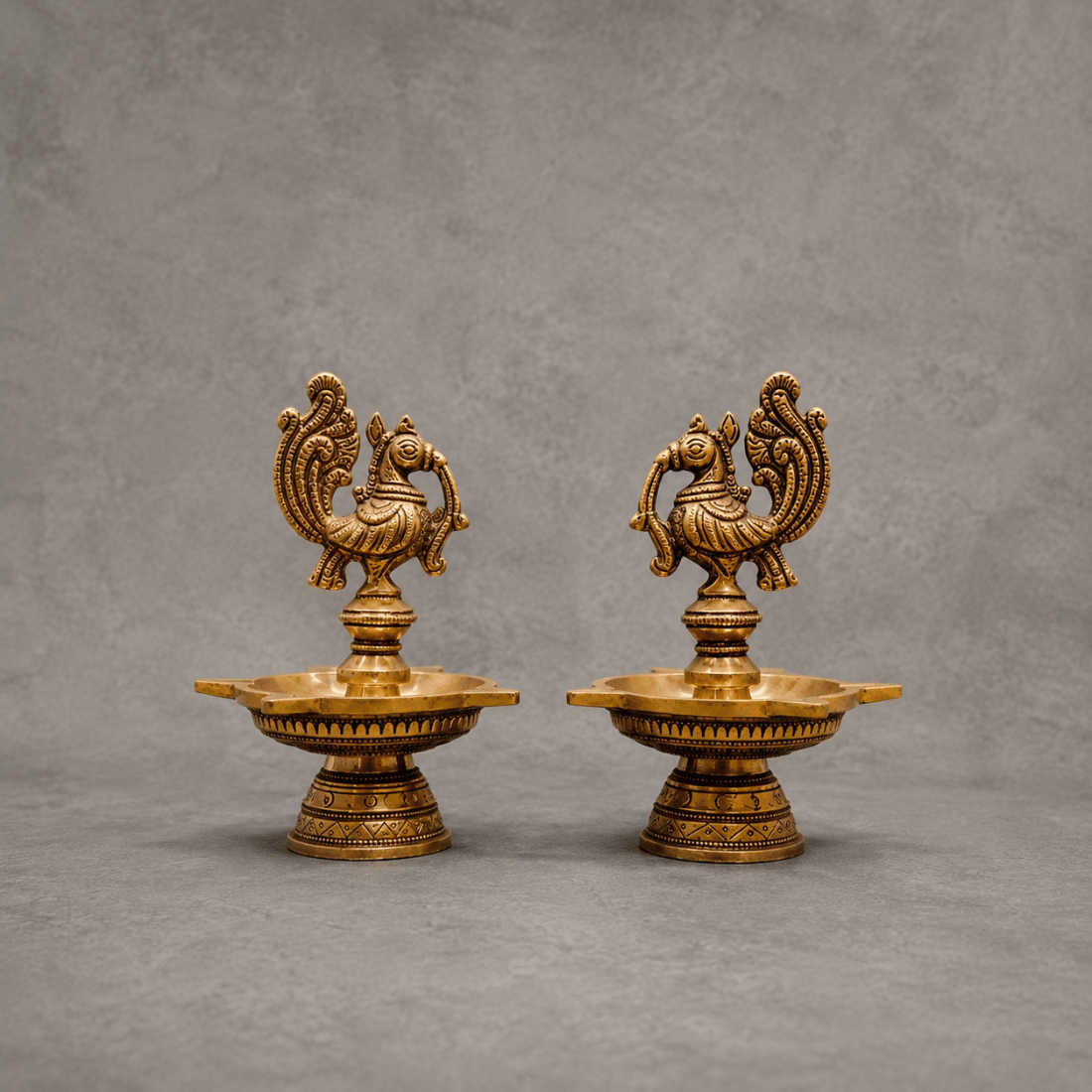 royal peacock diya lamp pair